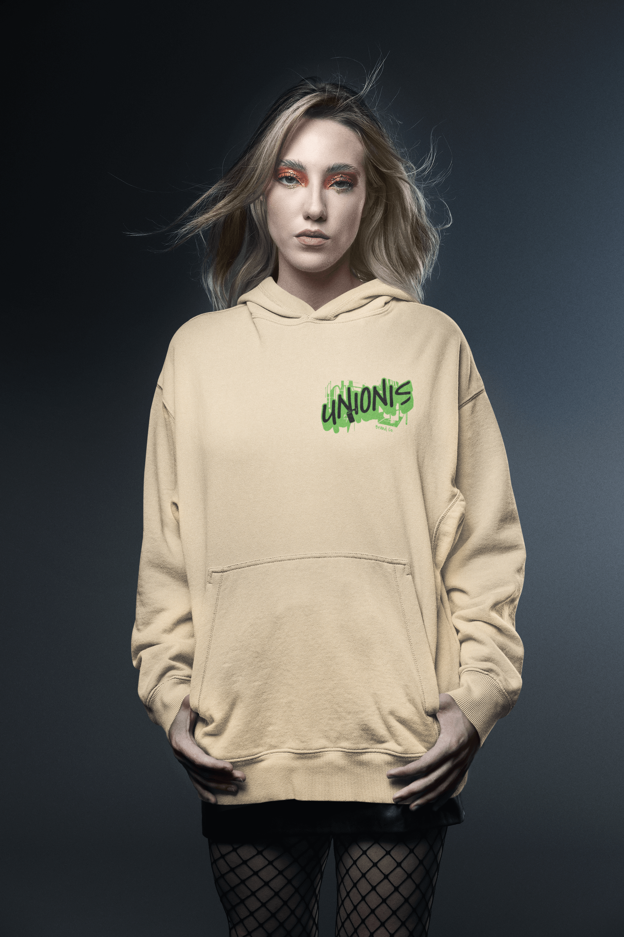 Beige unisex oversize hoodie with small Unionis logo, made of 320gr polycotton for a comfortable fit.